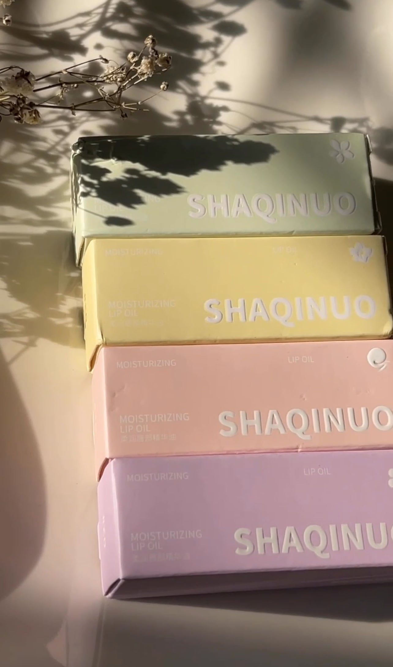 SHAQINUO LIP OILS